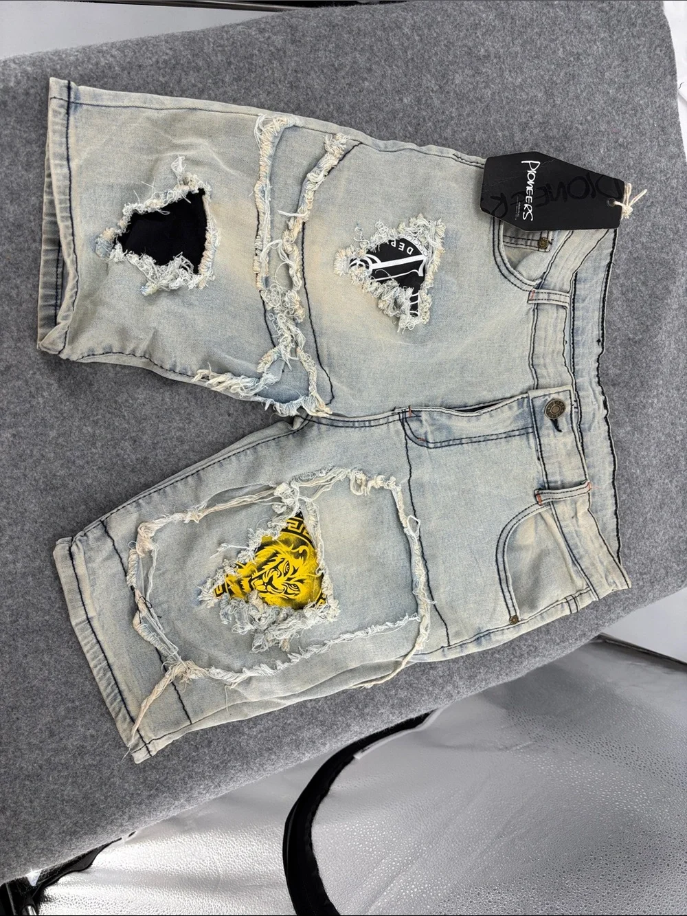 PIONEER Light Wash Distressed Denim Shorts with Black & Yellow Patches 34 NWT